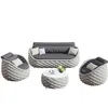 A set of outdoor furniture including a sofa, two armchairs, and a coffee table, arranged on a white background. Produktbild-Vorschau
