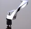 A close-up studio shot of a modern chrome faucet. Podgląd zdjęcia produktu