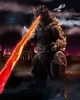 Godzilla is attacking a city with buildings on fire and firing atomic breath at jets. Náhled obrázku produktu