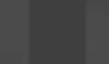 The image shows a dark gray vertical surface with subtle vertical lines, possibly representing a wall or a textured panel. Náhled obrázku produktu
