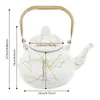 A white teapot with gold marbling and a gold handle, with dimensions overlaid on the image. Podgląd zdjęcia produktu