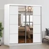 A white sliding door wardrobe with mirrored panels, reflecting a bedroom interior. Voir les images du produit