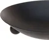 A close-up, angled view of a dark, round fire bowl with three small spherical feet. Anteprima dell’immagine prodotto