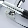 A close-up shot of a chrome and black kitchen spray nozzle. Produktbild-Vorschau