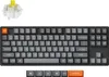 A mechanical keyboard and a keyboard switch are shown against a white background. Produktbild-Vorschau