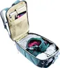 An open backpack filled with clothes and electronic devices. Voir les images du produit