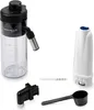 A collection of coffee machine accessories, including a milk frother carafe, a water filter, a coffee scoop, and a connection piece. Produktbild-Vorschau