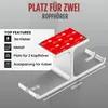A product image showing a silver headphone stand with adhesive strips for mounting, along with text highlighting its features. Produktbild-Vorschau
