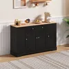 A black sideboard with a wooden top is shown in a room, decorated with coffee cups and a coffee machine. Produktbild-Vorschau