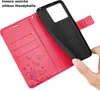 A red flip phone case is shown open, with a black inner case being inserted. A hand is holding the inner case. Produktbild-Vorschau