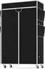 A black fabric wardrobe on wheels with white trim and side pockets. Produktbild-Vorschau