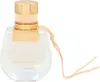 A clear, well-lit studio shot of a Chloé Nomade Eau de Toilette perfume bottle against a white background. Podgląd zdjęcia produktu