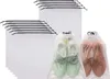 A pile of white mesh shoe bags, with two bags in the foreground containing shoes. Produktbild-Vorschau
