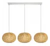 A three-light pendant lamp with bamboo shades. Produktbild-Vorschau