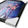 A framed picture of three anime-style characters, with protective plastic wrapping and corner protectors. Voir les images du produit