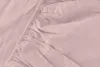 A close-up view of a pink fitted sheet, showing the elasticized edge. Produktbild-Vorschau