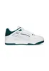 A white Puma sneaker with green accents is shown against a white background. Produktbild-Vorschau
