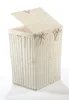 A white wicker laundry basket with a beige fabric liner and lid, shown against a white background. Náhľad obrázku produktu