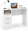 A white desk with a laptop, lamp, and books. Náhled obrázku produktu