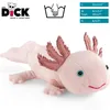 A plush axolotl toy is shown lying on a white background, with product information and a care symbol displayed in the upper right corner. Náhled obrázku produktu