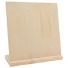 A wooden earring display stand with many small holes for organizing earrings. Produktbild-Vorschau