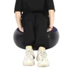 A person is sitting on an inflatable stool. Náhled obrázku produktu