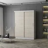 A sliding door wardrobe in a modern room setting with a bookshelf in the background. Voir les images du produit