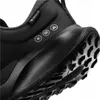 Close-up view of the heel and sole of a black Nike shoe. Produktbild-Vorschau