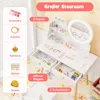 A child's vanity table with various accessories and storage options, presented in a bright, playful setting. Podgląd zdjęcia produktu
