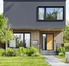 A modern house with a mailbox in front. Podgląd zdjęcia produktu