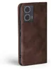 A close-up side view of a brown leather flip case for a smartphone, showing the camera module and side buttons. Produktbild-Vorschau