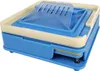 A blue and cream-colored capsule filling machine shown from a diagonal front view against a white background. Náhled obrázku produktu
