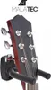 A close-up shot of a guitar headstock mounted on a wall-mounted guitar hanger. Voir les images du produit