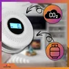 A CO2 and smoke detector is shown in a home environment, with icons representing CO2 and a gas cylinder, connected by arrows to the detector. Podgląd zdjęcia produktu