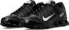 A pair of black Nike Reax 8 Tr Mesh sneakers. Anteprima dell’immagine prodotto