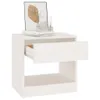 A white wooden nightstand with an open drawer, a stack of books, and a framed picture on top. Produktbild-Vorschau