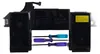 A black laptop battery with three screwdrivers in front of it. Náhled obrázku produktu