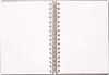 An open spiral-bound notebook with blank pages. Produktbild-Vorschau