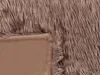 A close-up view of a brown faux fur blanket, showing the texture of the fur and the smooth backing. Náhled obrázku produktu