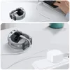 A smartwatch being charged via USB. Produktbild-Vorschau