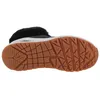 The sole of a black Skechers boot with a brown rubber sole and white midsole, shown from a side view. Voir les images du produit