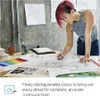 A person is working on architectural plans at a desk. Produktbild-Vorschau