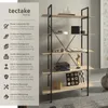 A tall, narrow bookshelf with a black metal frame and light wood shelves, decorated with various items. The left side of the image contains descriptive text and icons about the product's features. Náhled obrázku produktu