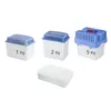 Three dehumidifier containers of different sizes (1kg, 2kg, 5kg) and a block of desiccant material are arranged on a white background. Anteprima dell’immagine prodotto