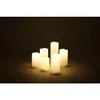A set of LED candles on a wooden surface. Produktbild-Vorschau