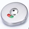 Close-up of a round, stainless steel bathroom lock with a red and green indicator. Voir les images du produit