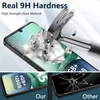 A smartphone screen protector being tested for hardness with a hammer, with inset images showing phone specifications and a cracked screen. Anteprima dell’immagine prodotto