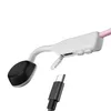 Close-up of a white and pink headphone with a USB-C cable connector. Produktbild-Vorschau