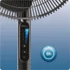 Close-up of a fan's control panel and a timer icon. Produktbild-Vorschau