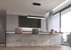 A modern kitchen island with bar stools and a pendant light. Náhled obrázku produktu